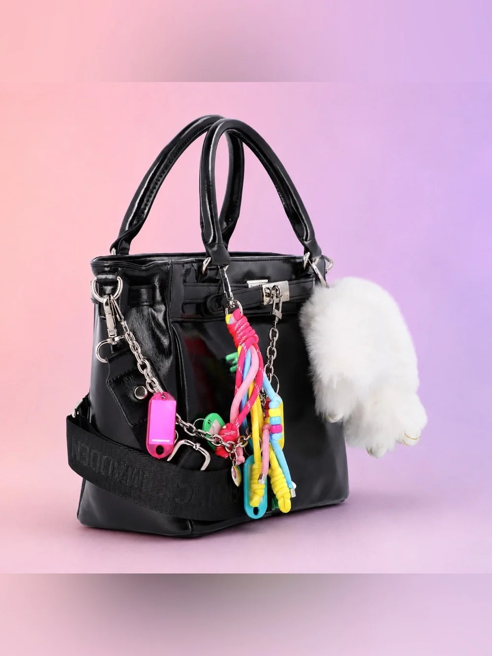 Black Patent Satchel with White Fur Charm and Colorful Tassel Accents